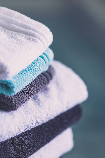 istock Freshly laundered washcloths and towels folded neatly 628994636