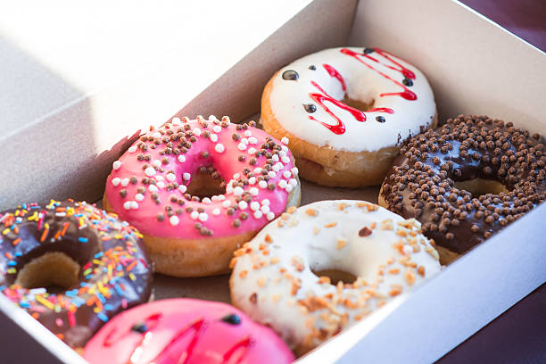 istock Colorful tasty doughnuts in the box 628996182