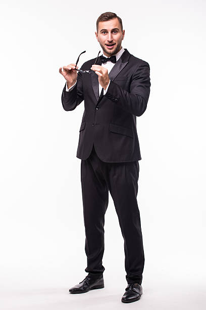 istock Man in suit cleaning glasses 628996994