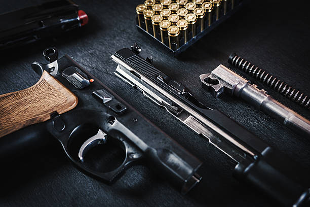 istock parts of the gun on the table 628997204