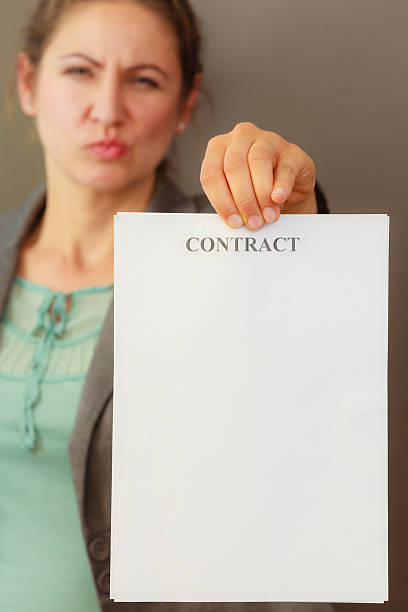 istock Business woman showing contract 629004514