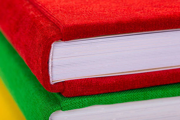 istock Multicolored book textile cover. Photobooks on a white background. 629005394