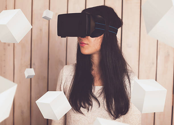 istock Woman in VR glasses 629005402