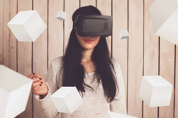 istock Woman in VR glasses 629005716