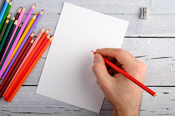 istock Colored pencils on white old wooden background. Top view. 629006402