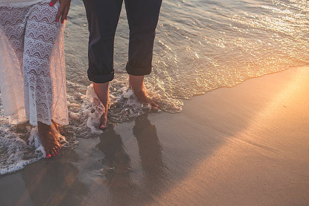 istock couple on the beach 629006712