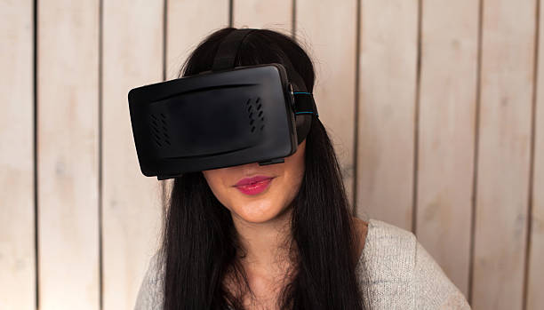 istock Woman in VR glasses 629007312