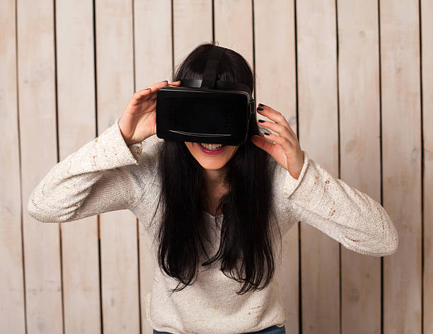 istock Woman in VR glasses 629007936