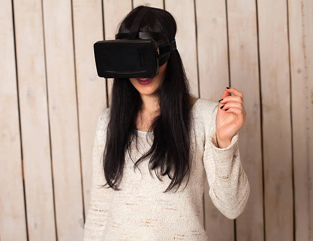 istock Woman in VR glasses 629009732