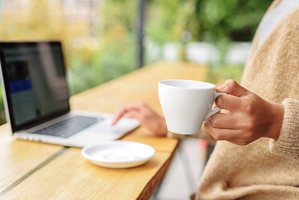 istock girl holding a mug with tea 629010044