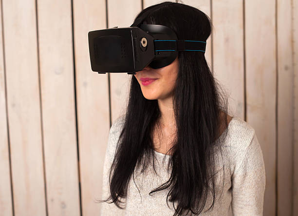 istock Woman in VR glasses 629010536