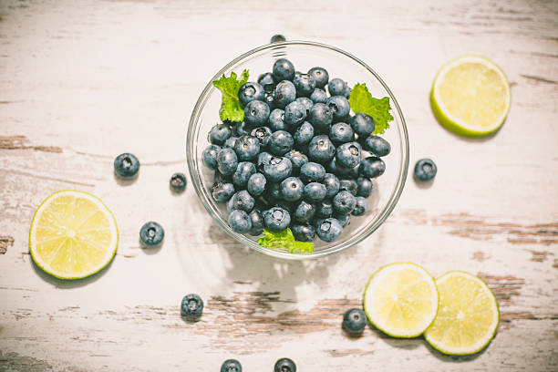 istock Juicy and fresh blueberries on rustic table. Bilberry on wooden 629011624