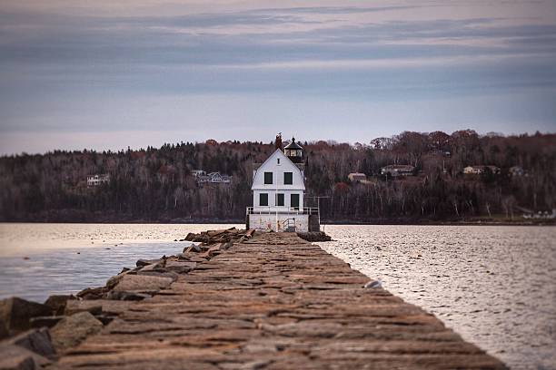 Rockland Breakwater Light Rockland Breakwater Light on a Fall Morning. groyne stock pictures, royalty-free photos & images