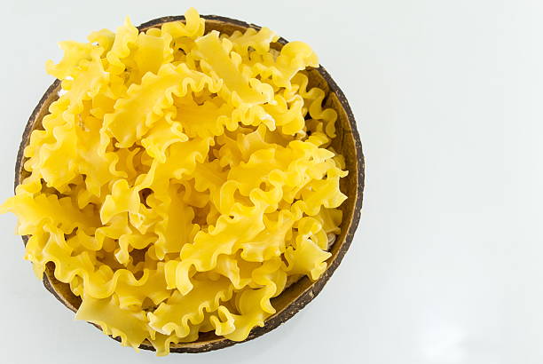 istock Uncooked bow tie farfalle pasta in a bowl 629012842