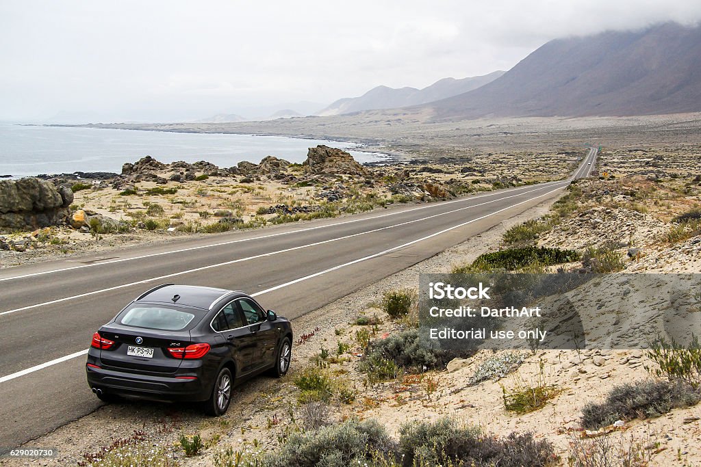 BMW F26 X4 Atacama, Chile - November 14, 2015: Black motor car BMW F26 X4 is parked at the roadside. BMW Stock Photo