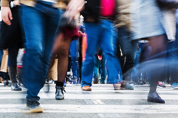 istock people crossing a street 629023480