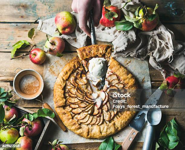 Mans Hand Holding Piece Of Apple Crostata Pie Stock Photo - Download Image Now - Apple - Fruit, Crostata, Galette