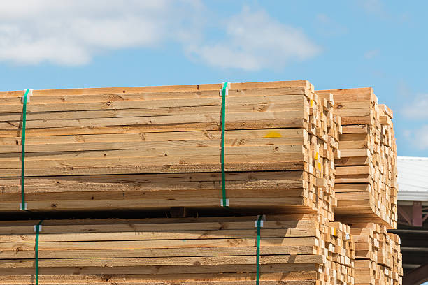 istock stacked wood planks ready for transportation 629027778