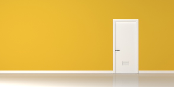 White door yellow wall