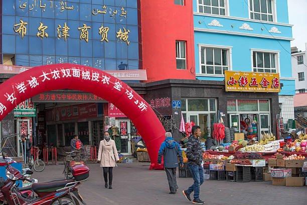 bazaar at buerjin downtown , xinjiang, china - urumqi stockfoto's en -beelden