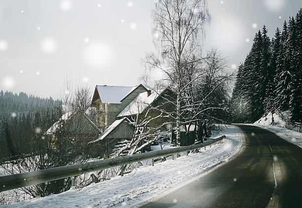 Winter road through a mountain pass. Winter holidays in the Carpathians
