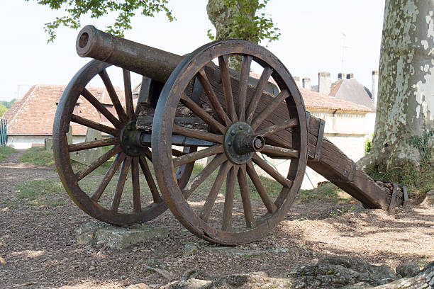 istock antique cannon with wooden wheels 629047186