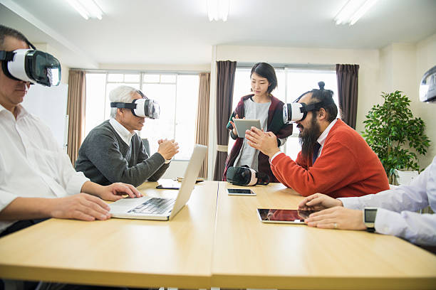 istock Business team meeting with VR headsetat 629049248