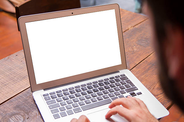 Businessman working on his laptop with copy space