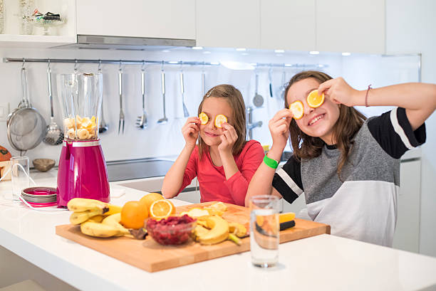 istock Cheerful girls in the kitchen 629052346