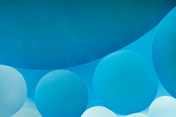 istock Abstract backgrounds. Oil babbles on water, abstraction . Macro 629053960