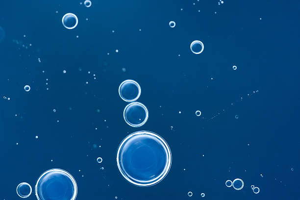 istock Abstract backgrounds. Oil babbles on water, abstraction . Macro 629061118