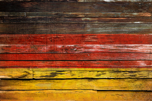 Flag of Germany painted on a grunge plank