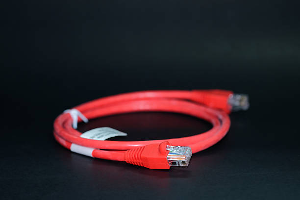 cavo di rete o spina rj45. colore rosso. - network connection plug rj45 cable bandwidth foto e immagini stock