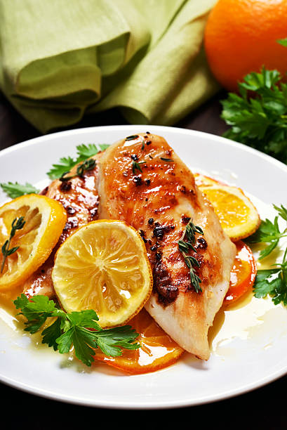 istock Roasted chicken breast in orange sauce 629062124