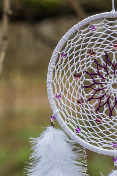 istock Dreamcatcher made of feathers, leather, beads, and ropes 629063152
