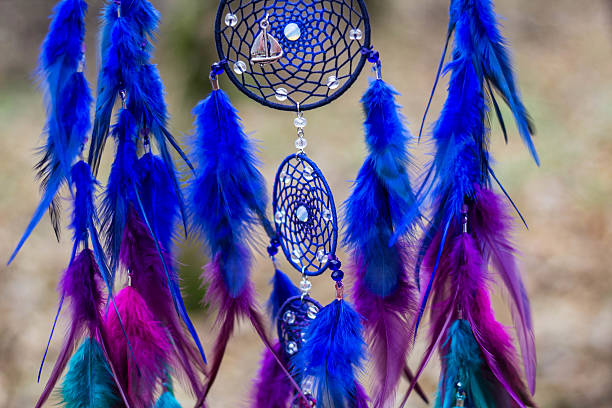 istock Dreamcatcher made of feathers, leather, beads, and ropes 629063998