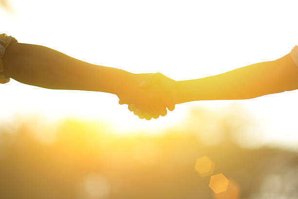 istock Handshake : Photos of hands touch each other 629064076