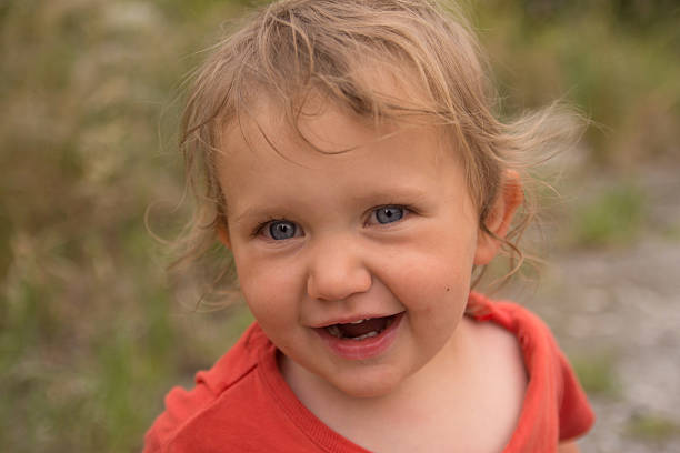istock Cute happy child with cheerful eyes 629070292