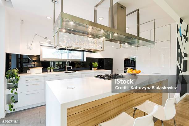 Loft Kitchen With Large Worktop Stock Photo - Download Image Now - Kitchen, Glamour, Kitchen Island