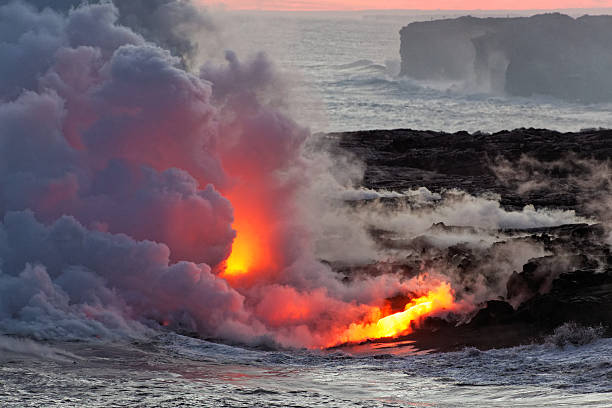 istock Lava flowing into ocean - Kilauea Volcano, Hawaii 629071178