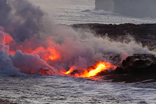 istock Lava flowing into ocean - Kilauea Volcano, Hawaii 629071342