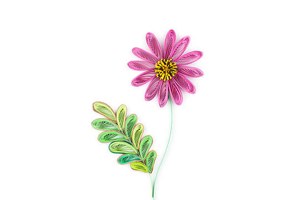 flower made by quilling on a light background. flower made by quilling on a light background paper quilling stock pictures, royalty-free photos & images