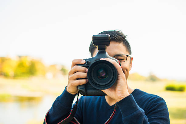 istock Professional Photographer taking a photo 629073278