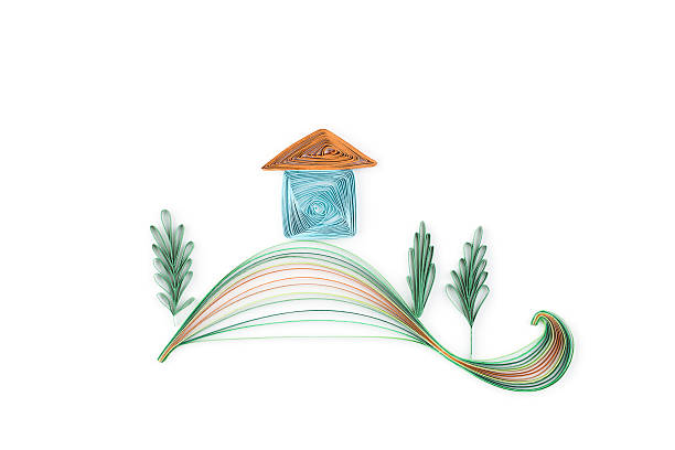 Small house made in quilling technique on white background. Small house made in quilling technique on white background paper quilling stock pictures, royalty-free photos & images