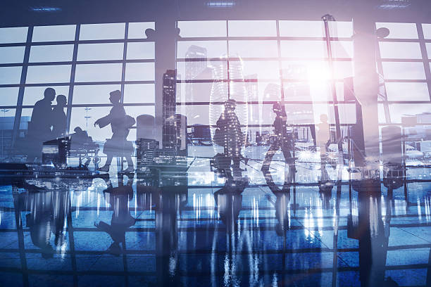 istock business people walking in the office, double exposure background 629074838