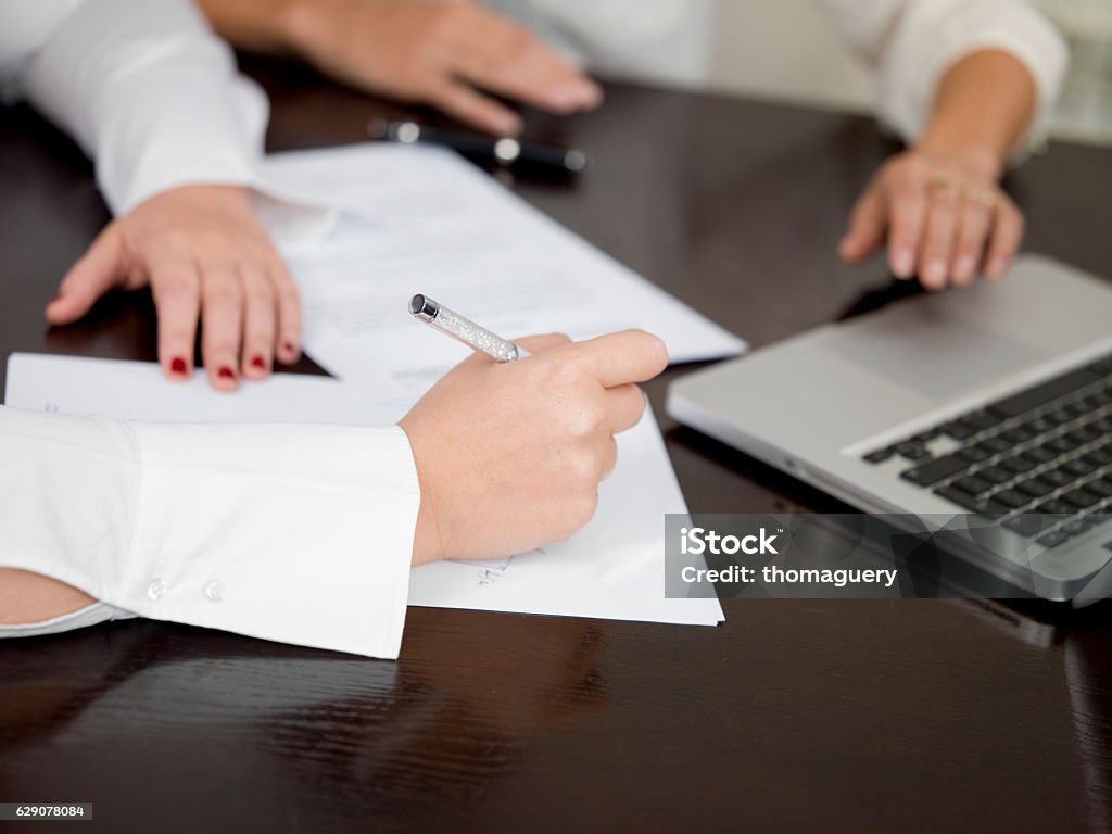 case study couple of lawyers preparing a case  or a contract Preparation Stock Photo