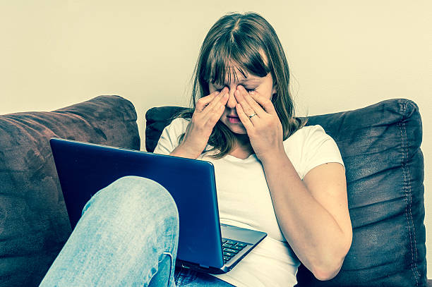 istock Woman with laptop having tired and sore eyes 629078964