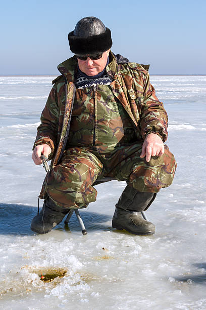 istock Ice Fishing photo. 629079330