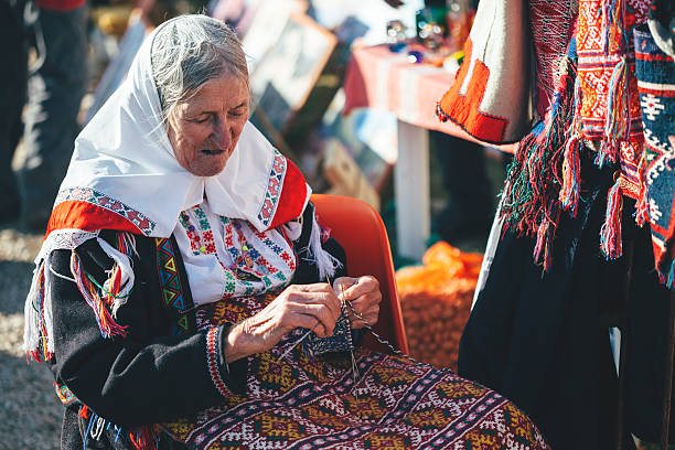 Benkovac, Croatia - December 10, 2016: Grandmother making her handicrafts, trying to keep the cultural heritage in Benkovac, Croatia.