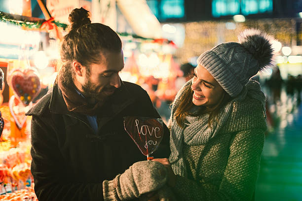istock Young Couple Having Fun Outdoors At Christmas Time 629101942